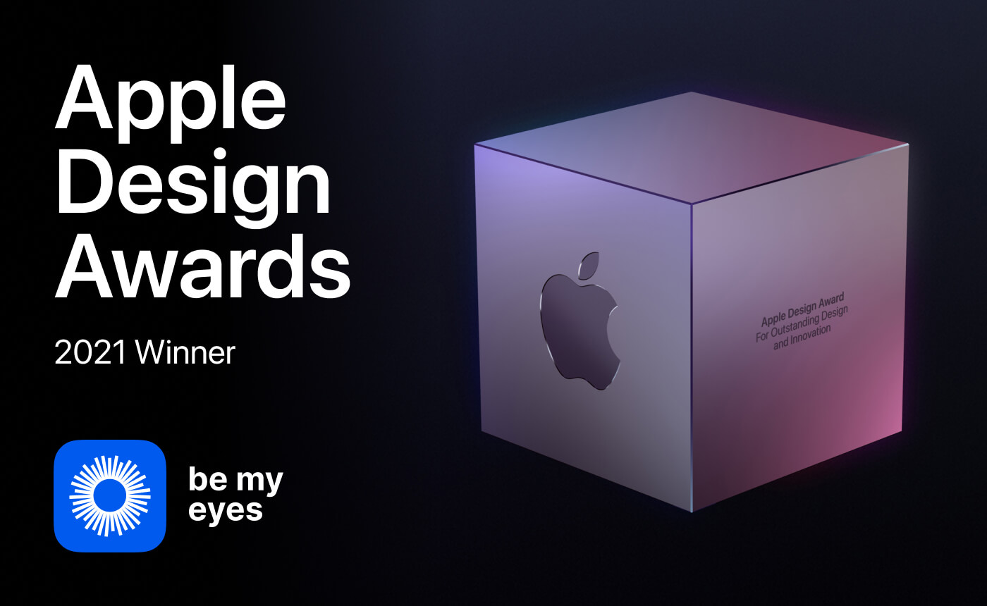 The Apple Design Awards 2021 graphic showcases a cube with the iconic Apple logo, celebrating "Be My Eyes" as a winner.