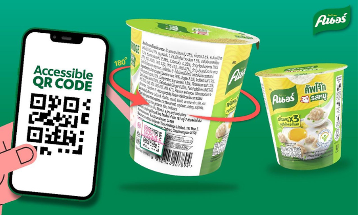 A hand holds a phone displaying a QR code. Nearby, a container with text and a dial showing a product is open, with an arrow pointing to ingredients. Green background with brand logo.