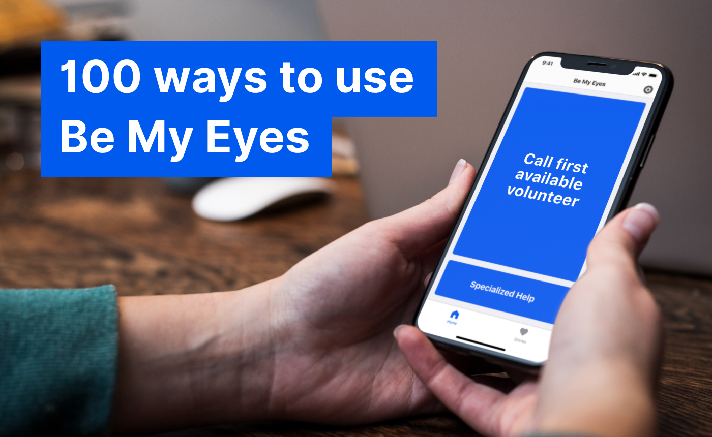 A person holds a smartphone displaying the Be My Eyes app, featuring an option to "Call first available volunteer." The image is accompanied by text that reads, "100 ways to leverage Be My Eyes for support and connection.
