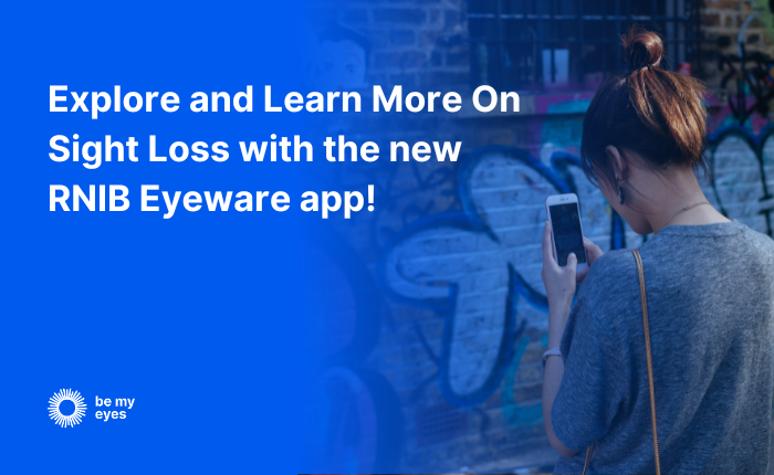 A woman with a bun checks her phone in front of a graffiti wall. The image highlights the RNIB Eyeware app, an innovative tool for exploring and understanding sight loss.