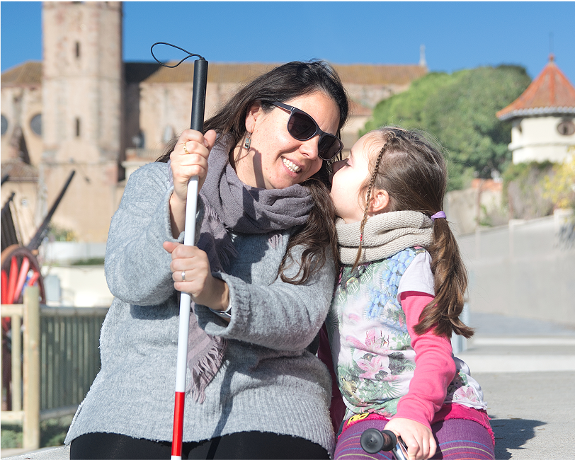 Picture of a Be My Eyes Service User and her child