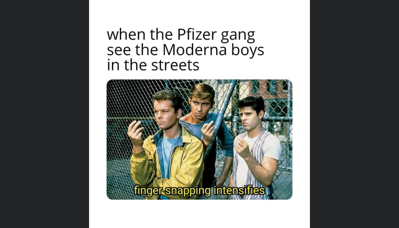 Three people stand in front of a chain-link fence, snapping fingers. The text reads: "when the Pfizer gang see the Moderna boys in the streets" with a caption that reads: "the air sizzles with rivalry and finger-snapping intensifies.