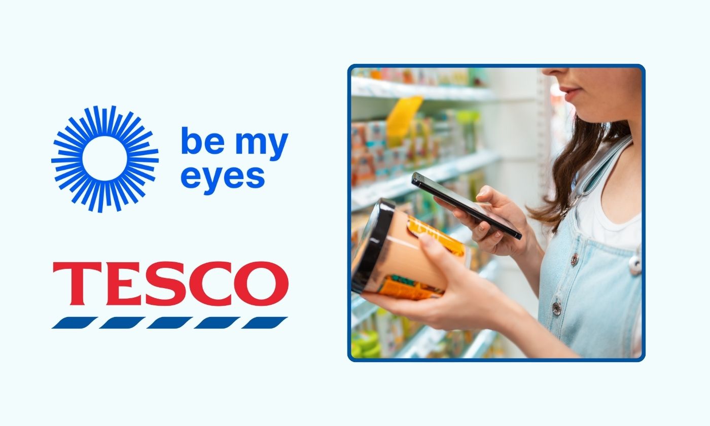 A woman scans a grocery item with her phone in a supermarket aisle. The Be My Eyes and Tesco logos appear on the left side of the image.